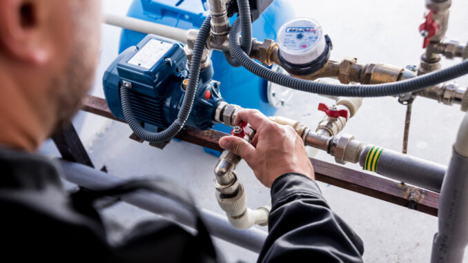 technician-checking-water-system-nodes