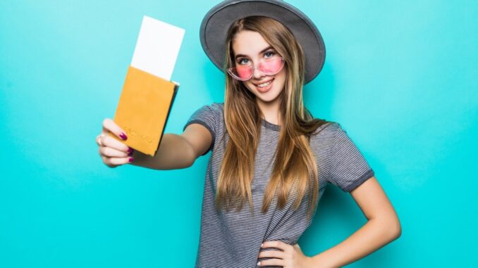 young-teenage-lady-holds-her-pas