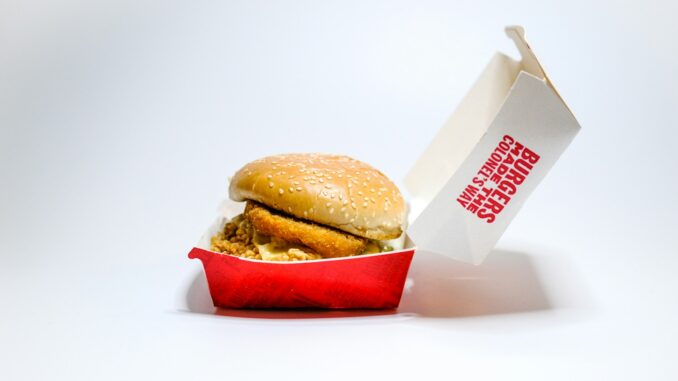 Photo by Nik burger with lettuce and tomato